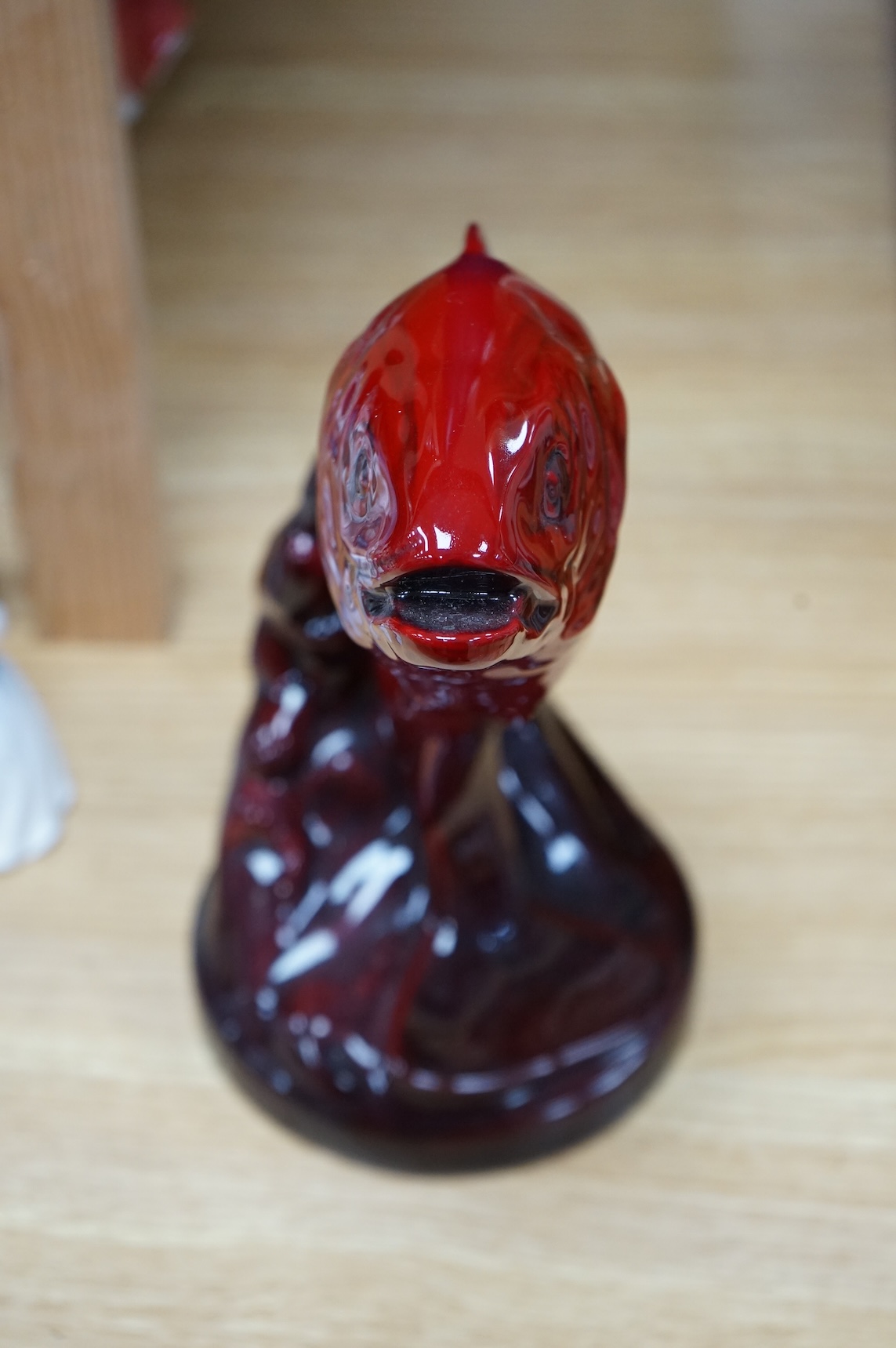 A Royal Doulton leaping salmon in flambe glaze, 31cm